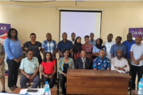 Acting Vice Chancellor for Hurbet Kairuki Memorial University, Professor Godwin Ndossi (seated on the center), officiating a four-days Research Fellow’s training for an HIV prevalence study in Nyarugusu and Nduta refugees camps in Kigoma Tanzania.