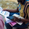 RA conducting quantitative interview during data collection